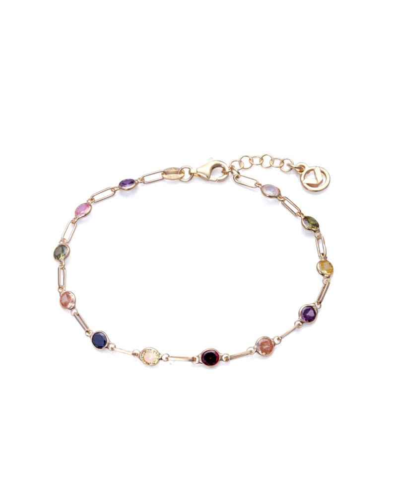 Pulsera de plata de ley bañada en oro con diferentes circonitas y colores.