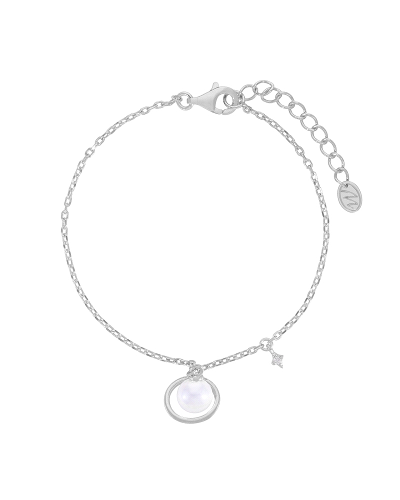 Pulsera de plata ed ley con perla planeta y circonita clavada.