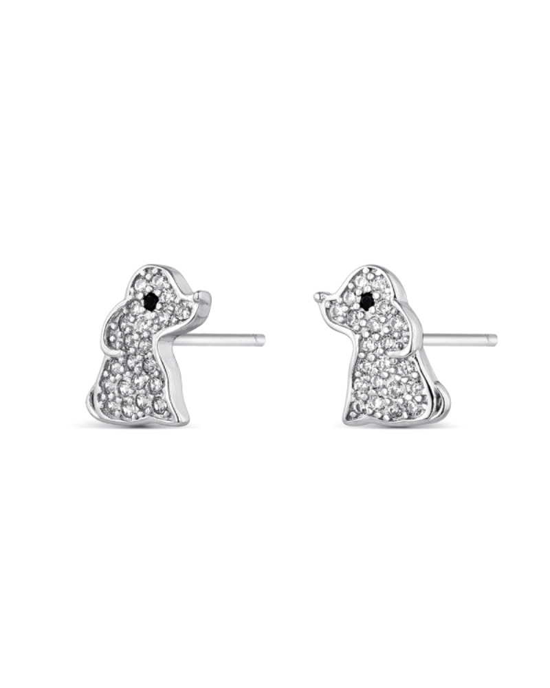 Estos encantadores pendientes están elaborados en plata de alta calidad y presentan un diseño adorable en forma de perro, adorna