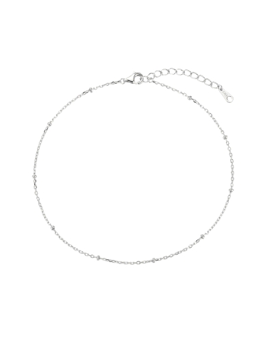 La tobillera de plata rodiada tiene una cadena con bolitas, con una longitud ajustable de 23 + 3 cm. Combina la elegancia de la 
