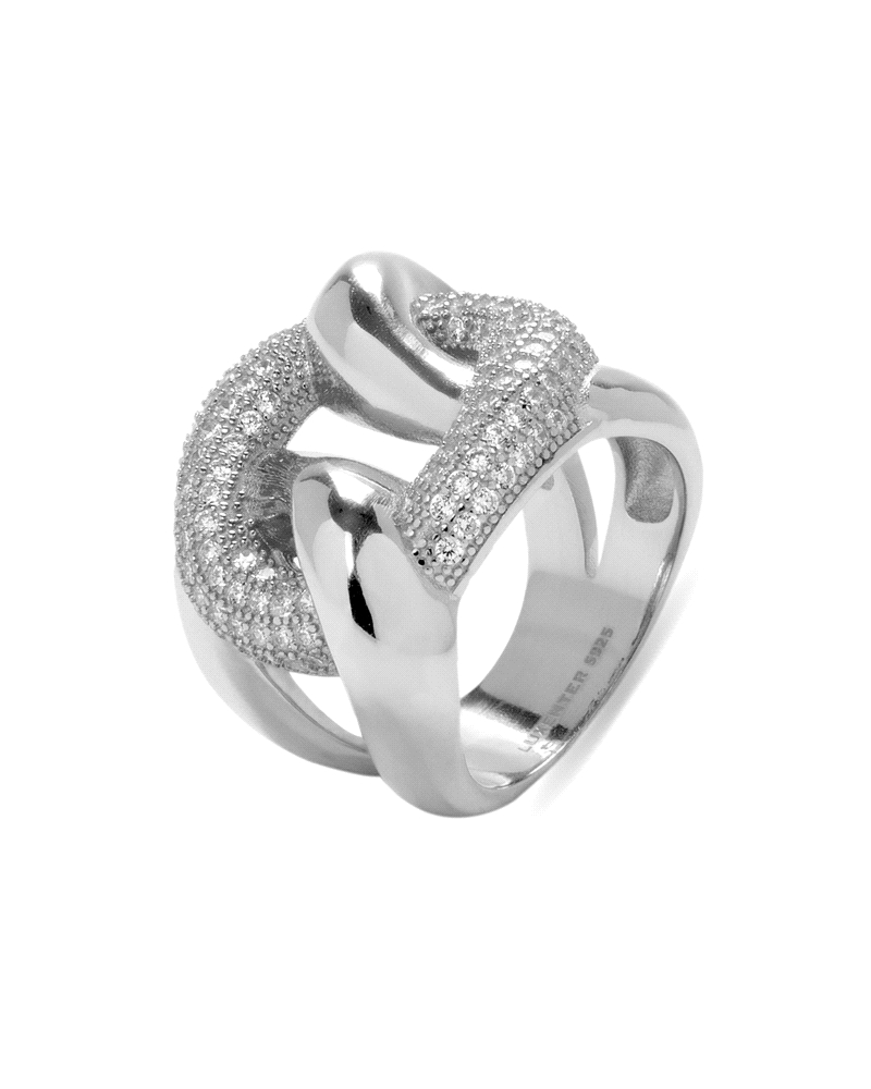 Un anillo de plata de ley entrelazado con circonitas blancas centrales es una pieza de joyería elegante y sofisticada. El diseño