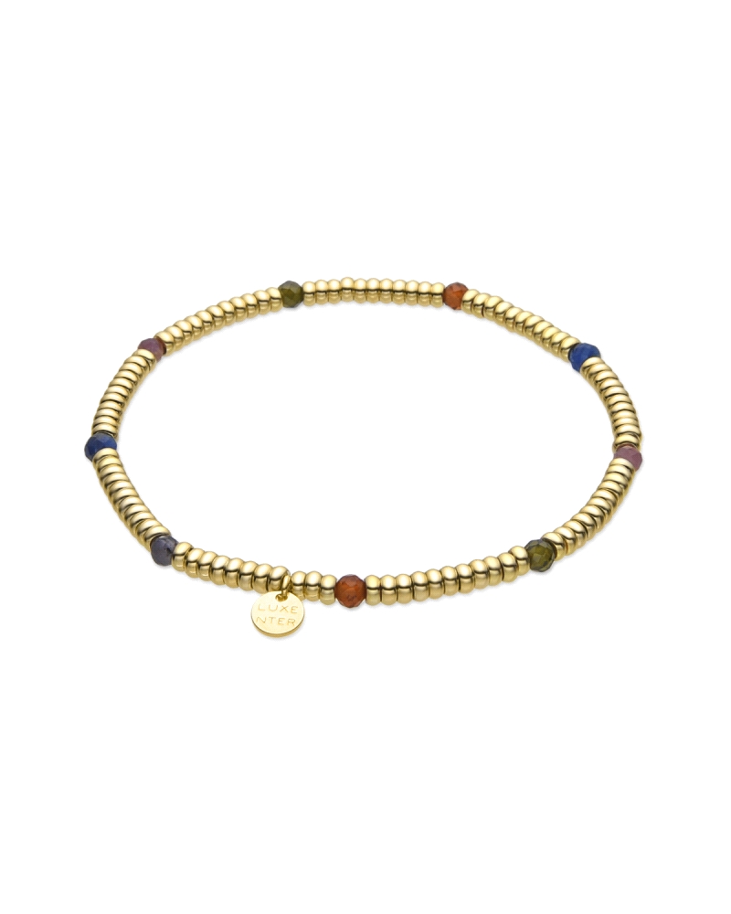 Pulsera elaborada en plata bañada en oro amarillo de 18K, que destaca por su diseño vibrante y colorido. Esta pieza está compues