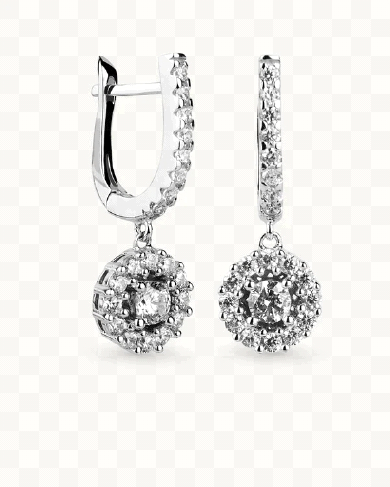 Pendientes en plata de ley 925mls con doble baño de platino y rodio y circonitas EXCELLENCE STAR CUT talladas con los estándares