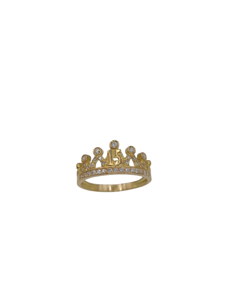 Una sortija de oro de 18k, con un diseño que evoca la elegancia de una corona real. La banda de la sortija es de un acabado suav