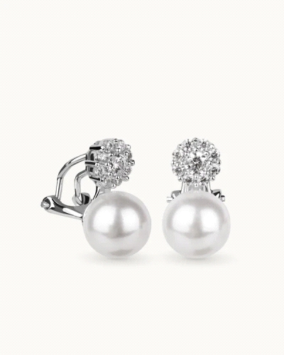 Los pendientes de plata de la marca T ADORO con circonitas y perla de concha son una joya exquisita que combina elegancia y sofi