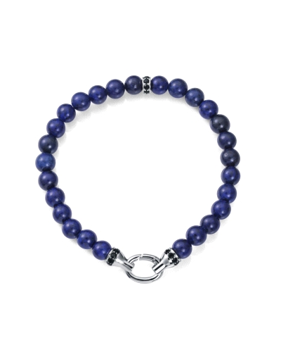 Una pulsera que combina la sofisticación de la plata de primera ley con la energía de las piedras naturales. Fabricada con un ba