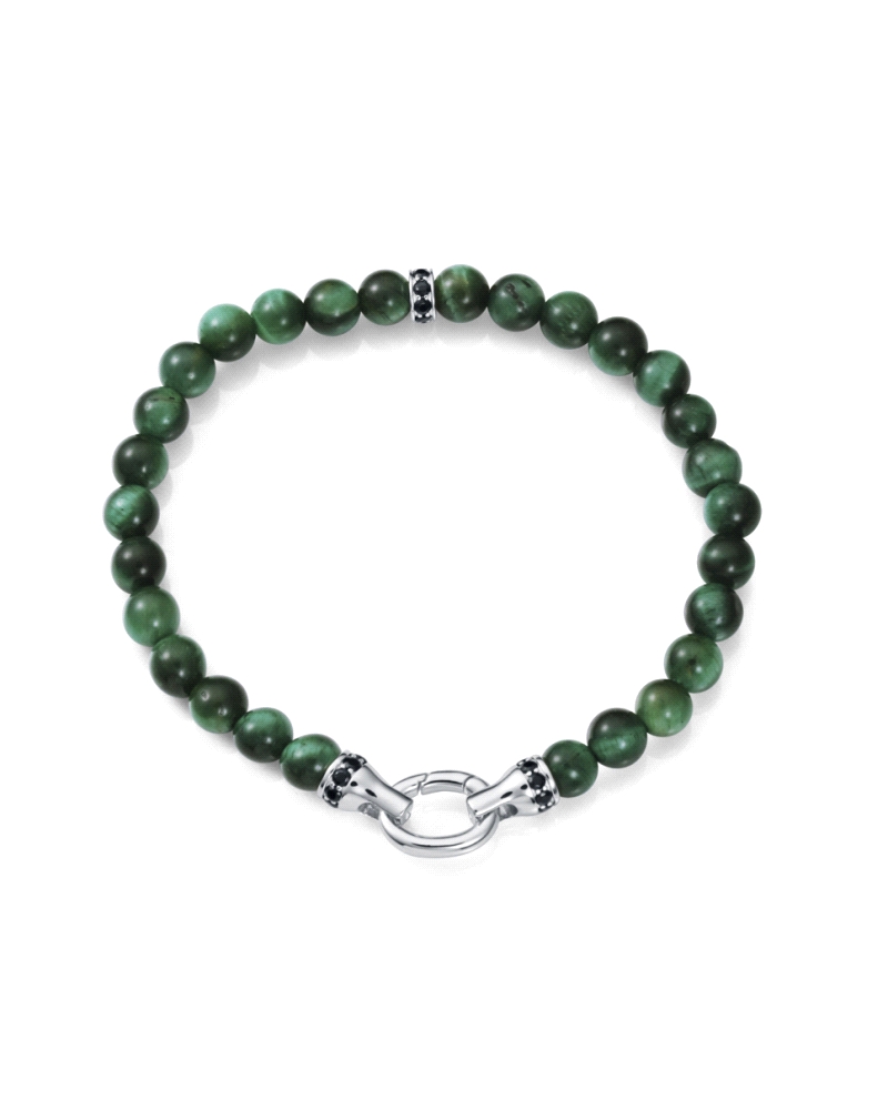 Una pulsera que fusiona elegancia y energía natural en un diseño sofisticado. Fabricada en plata de primera ley con un baño de r