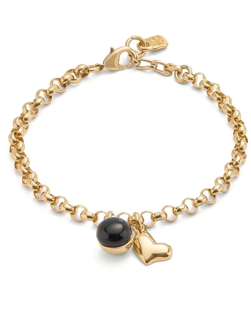 Amor y magnetismo en estado puro.
Esta pulsera bañada en oro de 18 quilates, con cadena de eslabones redondeados, es un símbolo