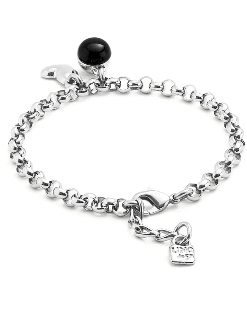 Elegancia con alma.
Esta pulsera con cadena de eslabones redondeados destaca por su diseño sutil pero con carácter. Los dos cha