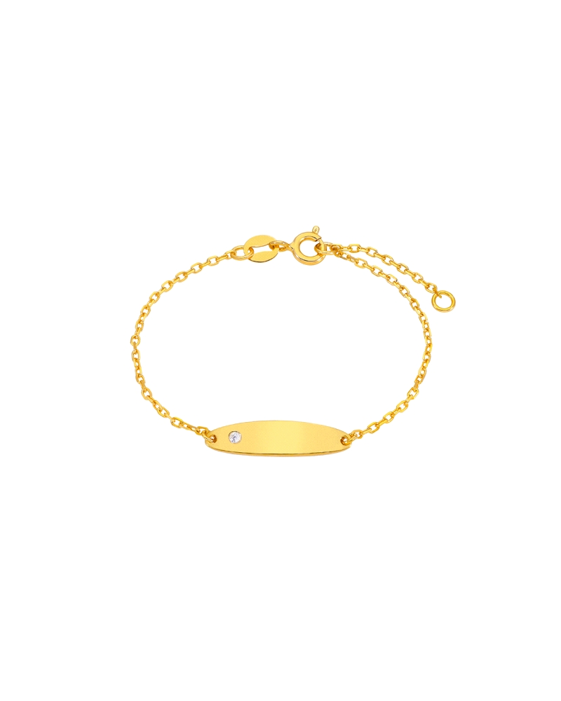 Pulsera con plaquita grabable y circonita en plata de ley 925 bañada en oro de 18k. Cadena 12 + 2 cm y cierre de reasa. Elegante