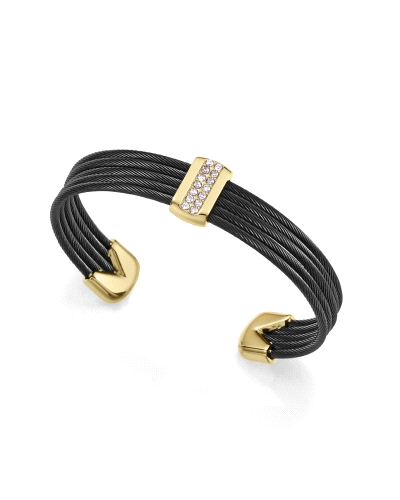 Una pulsera que irradia sofisticación y estilo contemporáneo. Fabricada en acero con acabados IP negro y dorado, presenta múltip
