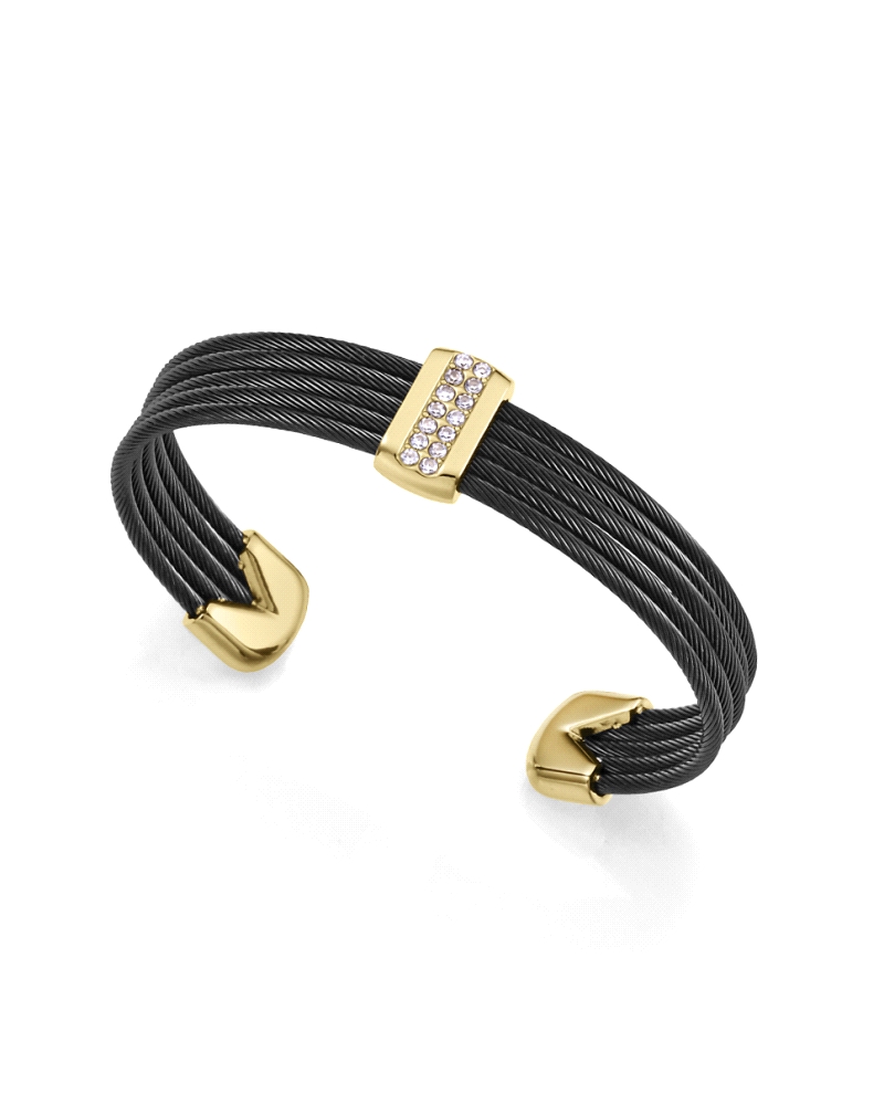 Una pulsera que irradia sofisticación y estilo contemporáneo. Fabricada en acero con acabados IP negro y dorado, presenta múltip