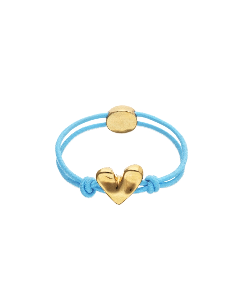 Pulsera de hilo azul con corazón bañado en oro 18k. Cuando algo dentro de ti palpita con fuerza, solo hay una forma de escucharl