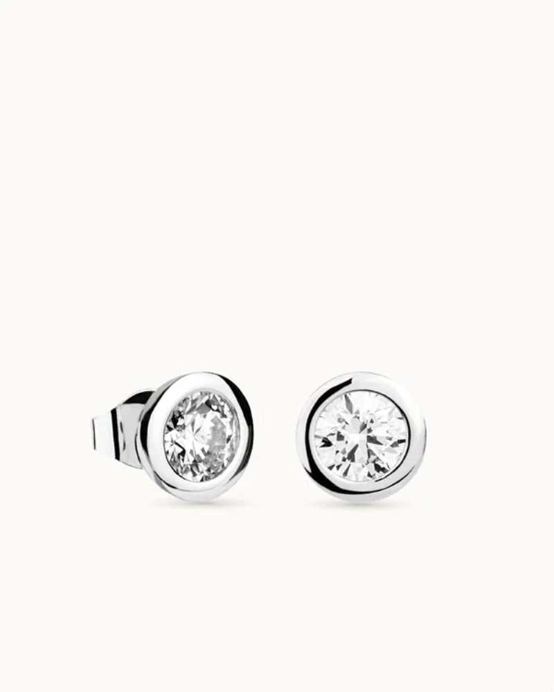 Pendientes en plata de ley 925mls con doble baño de platino y rodio y circonitas EXCELLENCE STAR CUT talladas con los estándares