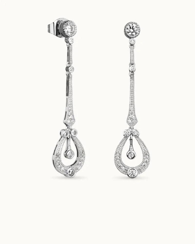 Pendientes en plata de ley 925mls con doble baño de platino y rodio y circonitas EXCELLENCE STAR CUT talladas con los estándares