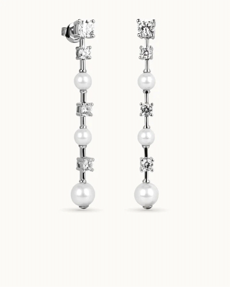 Pendientes en plata de ley 925mls con doble baño de platino y rodio y circonitas EXCELLENCE STAR CUT talladas con los estándares