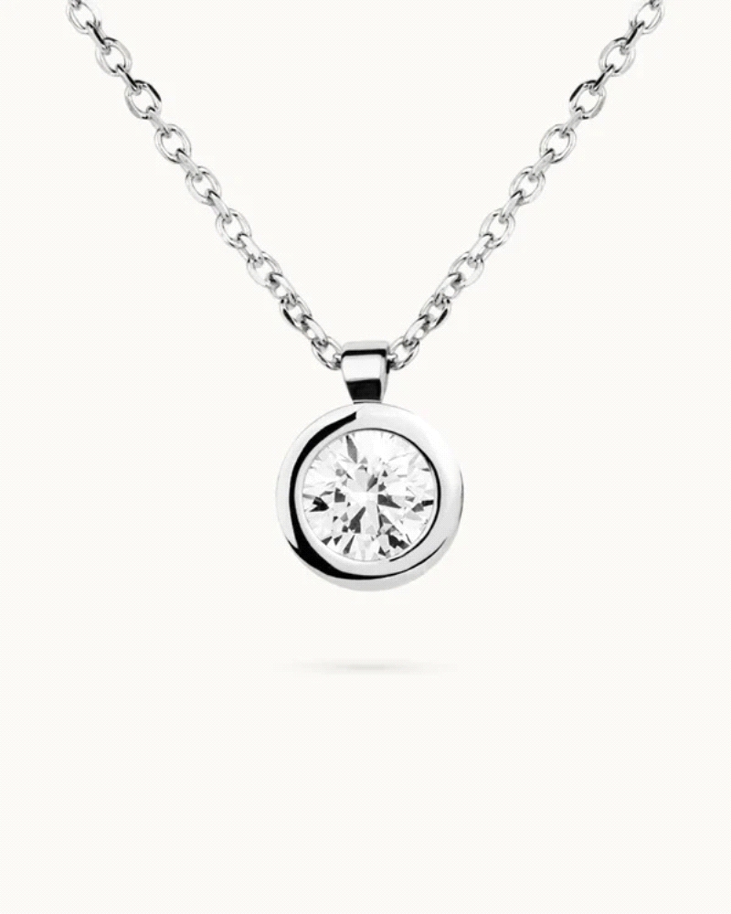 Collar punto de luz en plata de ley 925mls con doble baño de platino y rodio y circonita EXCELLENCE STAR CUT tallada con los est