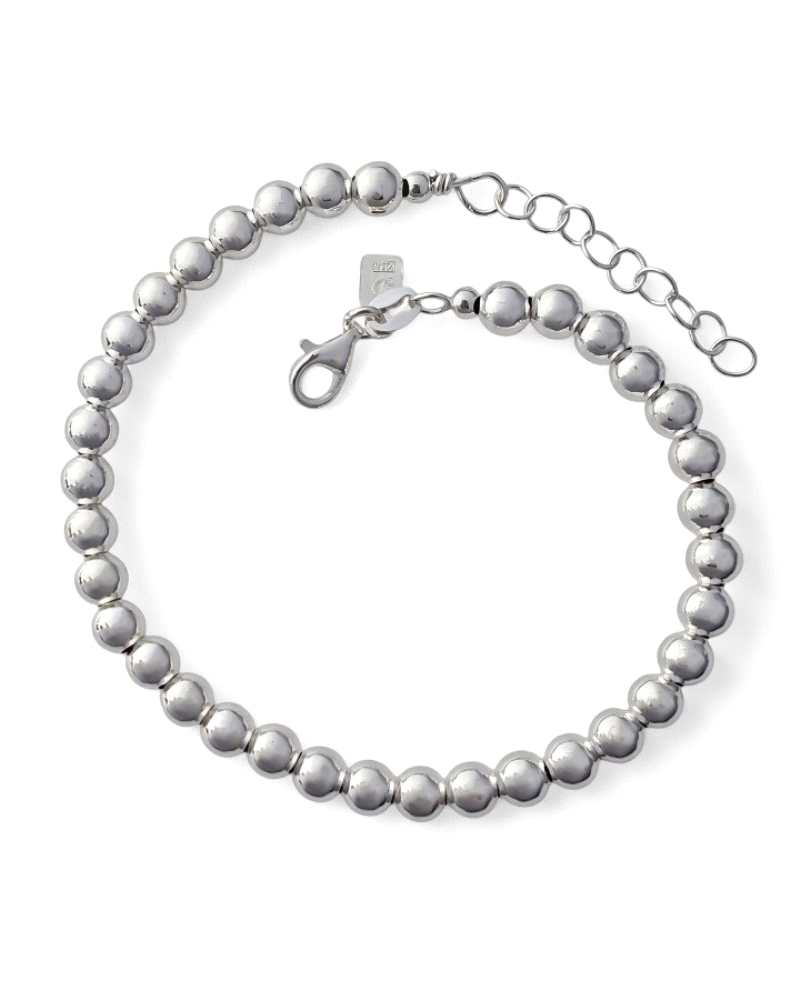 Pulsera de plata de ley 925 de bolas ( 5mm ) de 18.5 cm de largo + cadena adaptable de 2.5 cm.