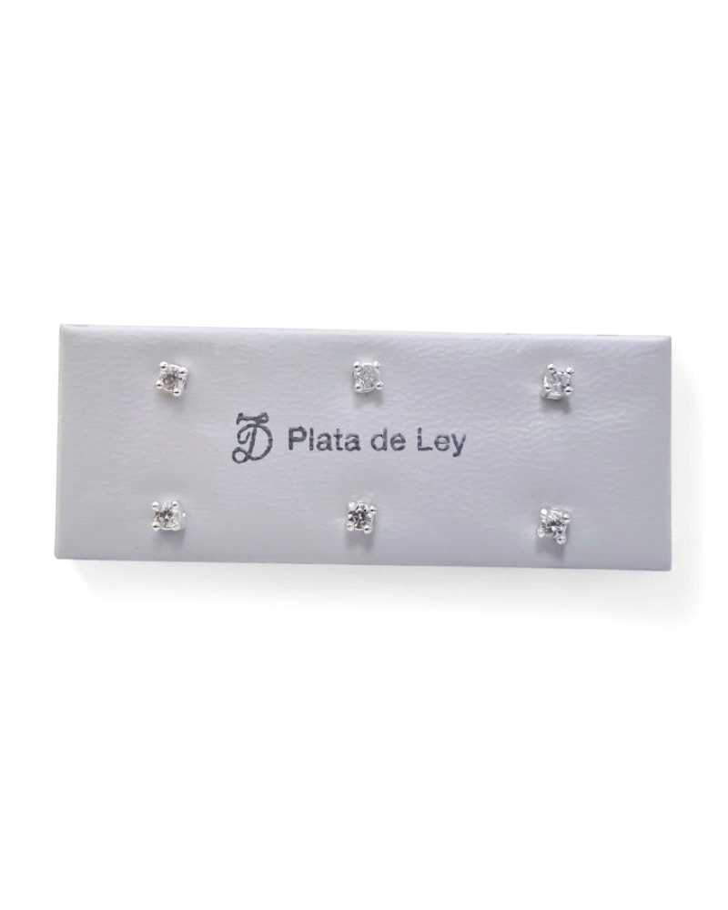 Pendiente de plata de ley 925 de garra con circonita ( 2.5mm ) y cierre a presión.