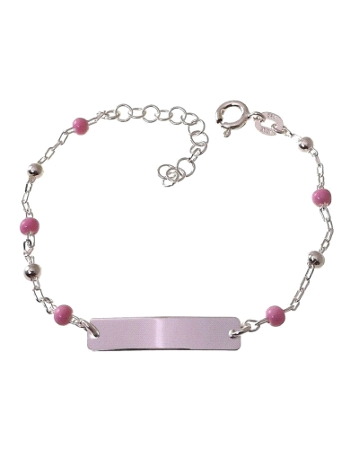 Esclava para niña de plata con bolitas esmaltadas en color rosa.
